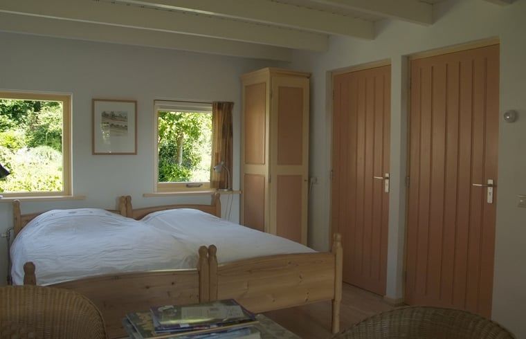 Schlafzimmer in Cottage in Zuidwolde, Ferienhaus mit Holzmoebeln, Suedwest-Drenthe, Drenthe.