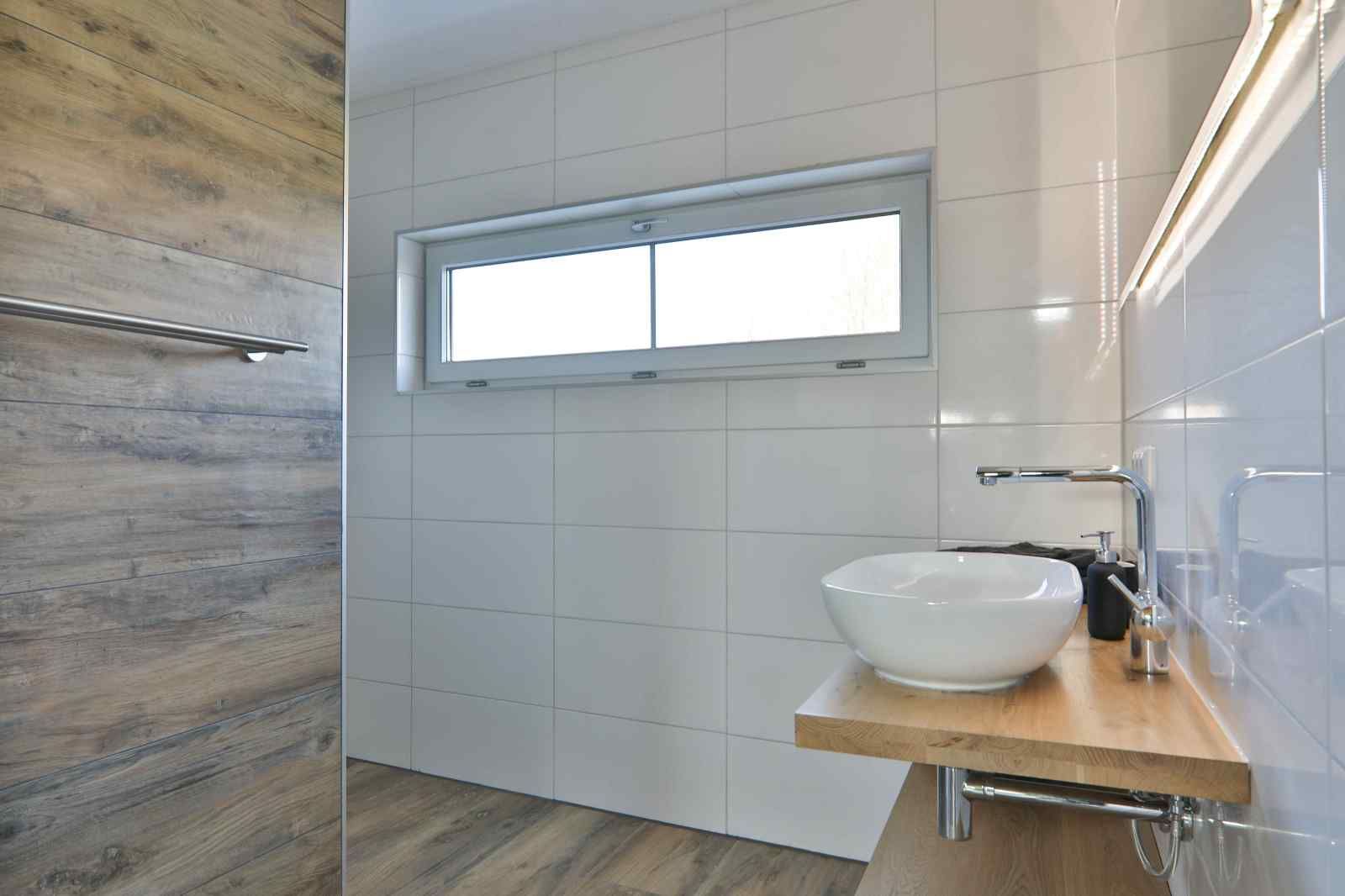 Spacious garden at DG1415, vacation home in Zuidwolde, surrounded by nature.