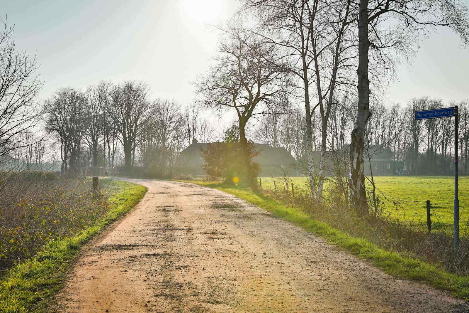 Cozy living room with stairs in DG1415, vacation home in Zuidwolde, Drenthe.