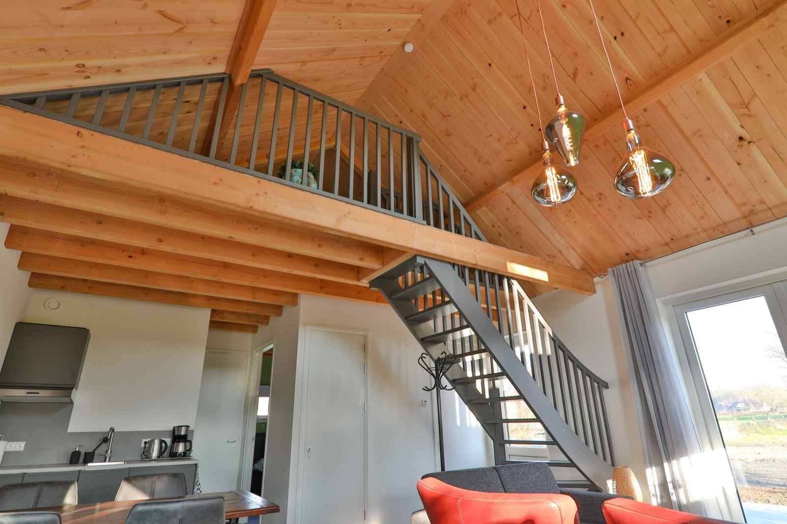 Bright living room with view in DG1415, vacation home in Zuidwolde, Drenthe.