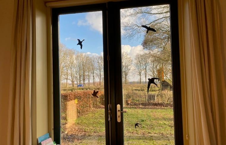 Gemuetliches Wohnzimmer im Ferienhaus in Ruinen, Suedwest-Drenthe.