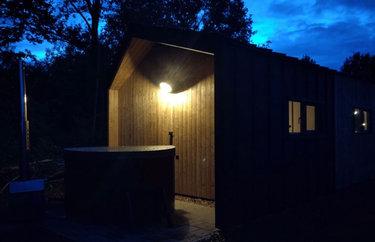 Cozy night environment at Holiday home in Vledder with hot tub in Drenthe.