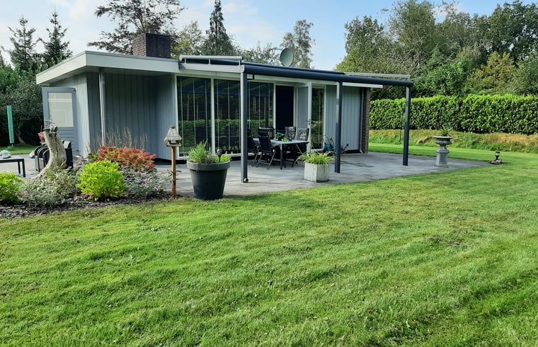Cozy sitting area in Holiday Home in Wittelte, perfect for a relaxing stay in Drenthe.