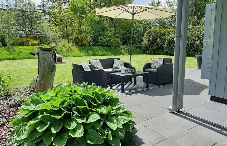 Luxury interior of Holiday Home in Wittelte, Southwest Drenthe, with comfortable seating area.