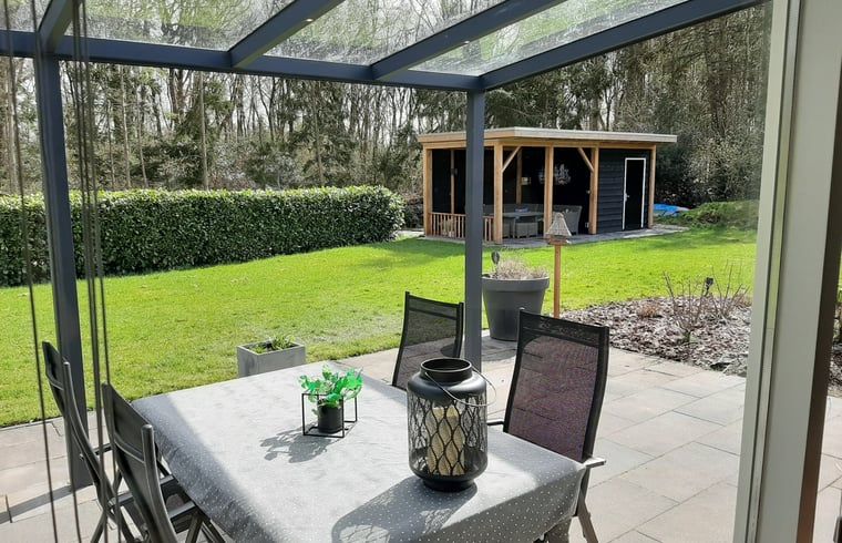 Cozy bedroom in Holiday Home in Wittelte, Southwest Drenthe, with rustic decoration.