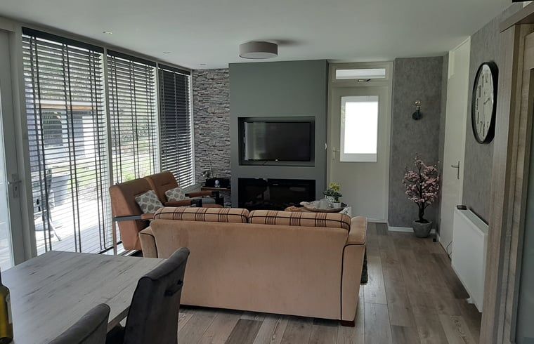 Veranda of Holiday Home in Wittelte, Southwest Drenthe, with comfortable seating.