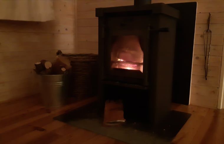 Cozy wood stove in Cottage in Koekange, vacation home in Southwest Drenthe, for a warm atmosphere.