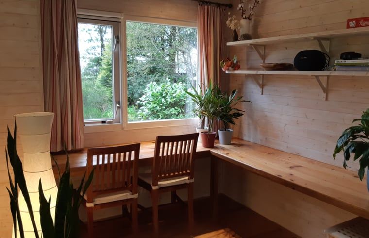 Workspace overlooking nature in Cottage in Koekange, vacation home in southwest Drenthe, ideal for rest.