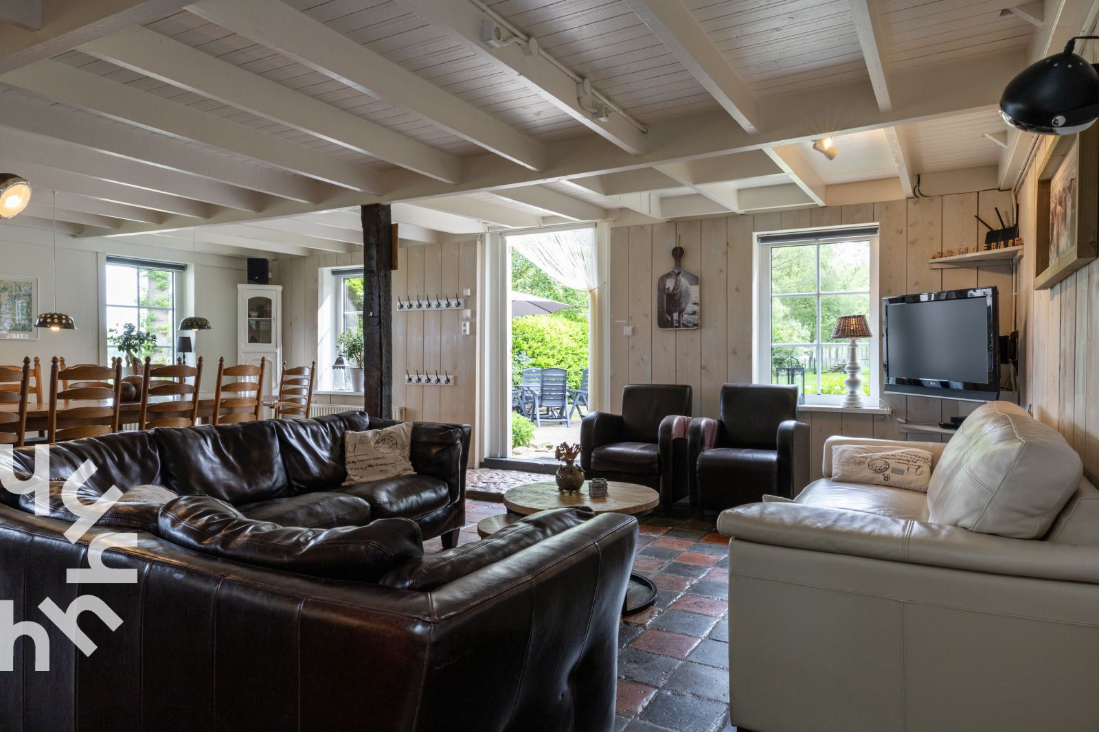 Grosser Garten mit Spielgeraeten im Ferienhaus DG940 in Koekange, Drenthe.