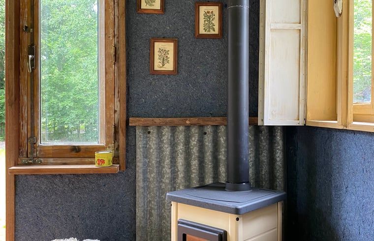 Wood stove for a warm atmosphere in Cottage in Veenhuizen, located in Frederiksoord, Drenthe.