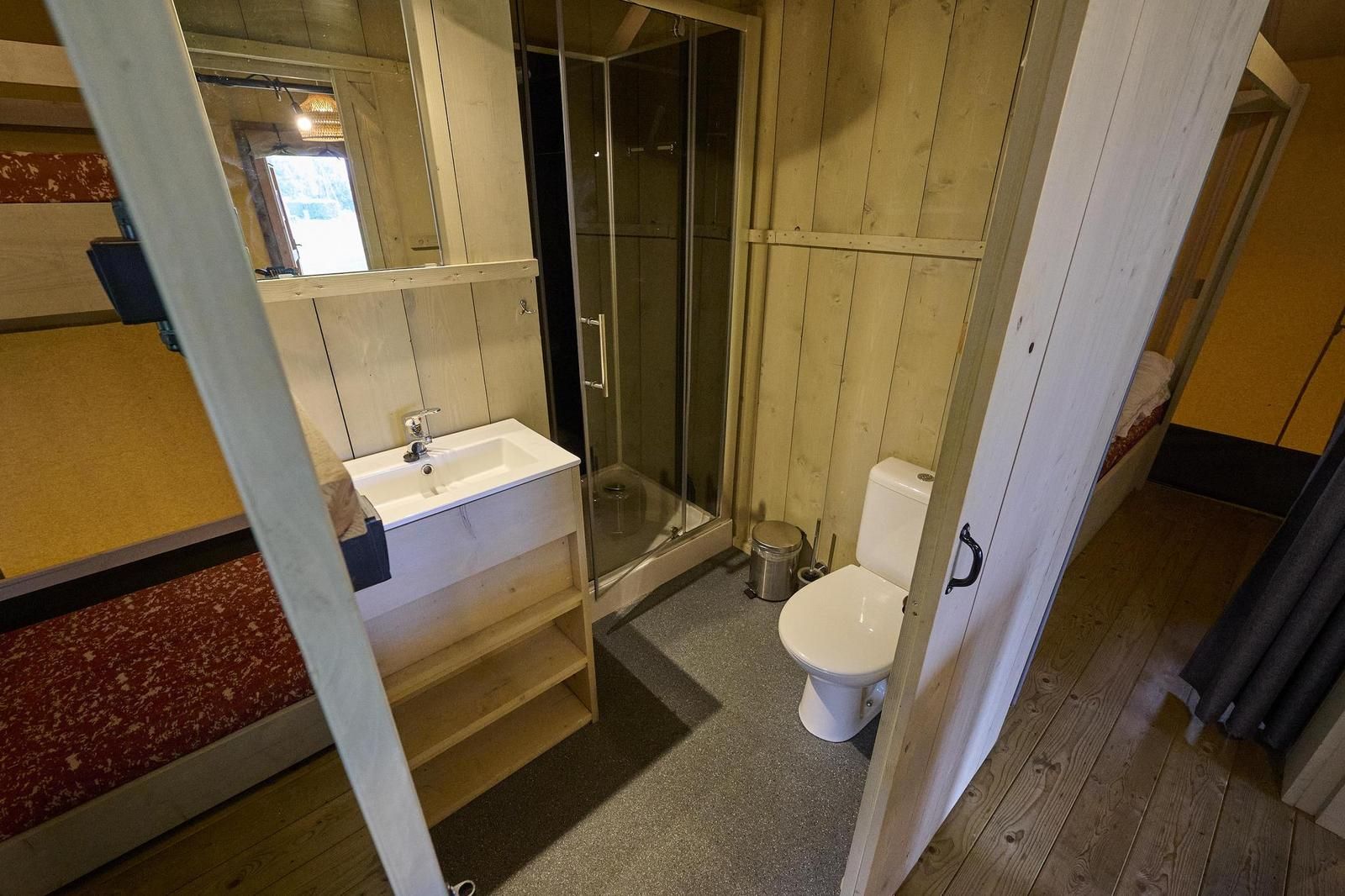 Second bathroom in Safari Tent Wood, Biddinghuizen, with modern shower and sink in Flevoland.