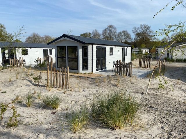 Detached house in Biddinghuizen, vacation home in Eastern Flevoland with modern veranda and surrounded by natural beauty.