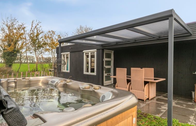 Comfortable bedroom in Holiday Home in Dronten with stylish interior, located in Eastern Flevoland, ideal for restful nights.