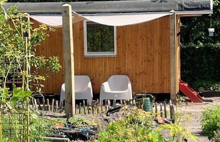 Ferienhaus in Appelscha mit gemuetlicher Terrasse und Garten, ideal zum Entspannen in den friesischen Waeldern.