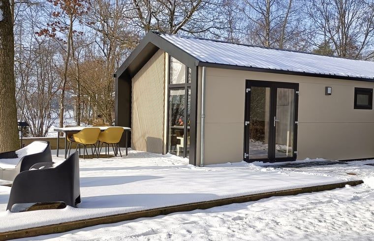 Enjoy the peace and quiet on the terrace of the vacation home in Oosterwolde, surrounded by the Frisian forests in Friesland.