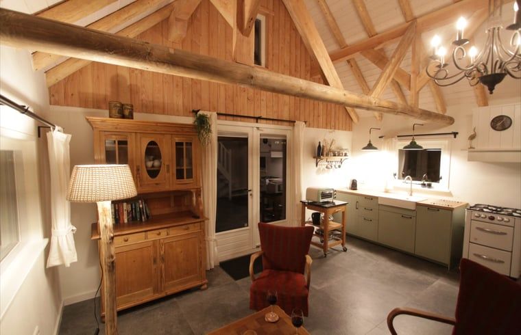 Living room and kitchen in Cottage in Haulerwijk, vacation home in Friesland.