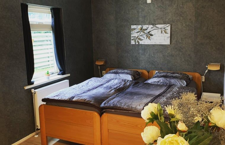 Comfortable bedroom in Holiday home in Steggerda, surrounded by Frisian nature.