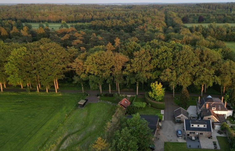 Aerial view of Holiday home in Steggerda, surrounded by Frisian forests.