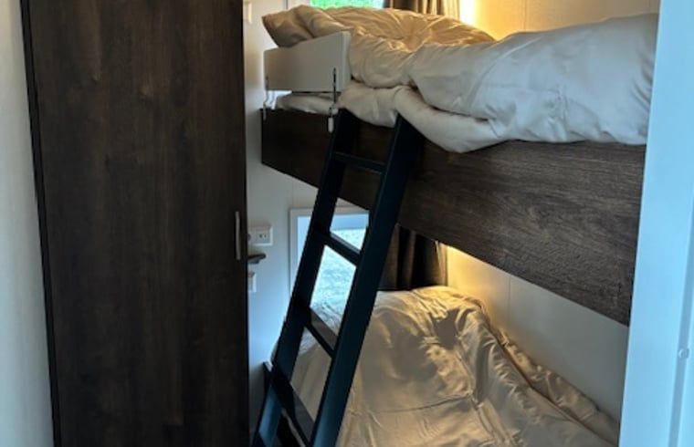 Knusse stapelbedkamer in Vakantiehuis in Blesdijke, perfect voor kinderen.