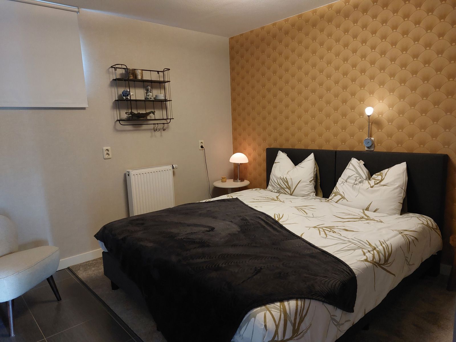 Attractive bedroom in vacation home FR440 in the Frisian countryside with comfortable bed.