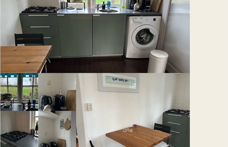 Moderne Kueche im Ferienhaus in Nijeholtpade, Friesland, mit Waschmaschine und Essecke, ideal fuer einen entspannten Aufenthalt in der friesischen Landschaft.