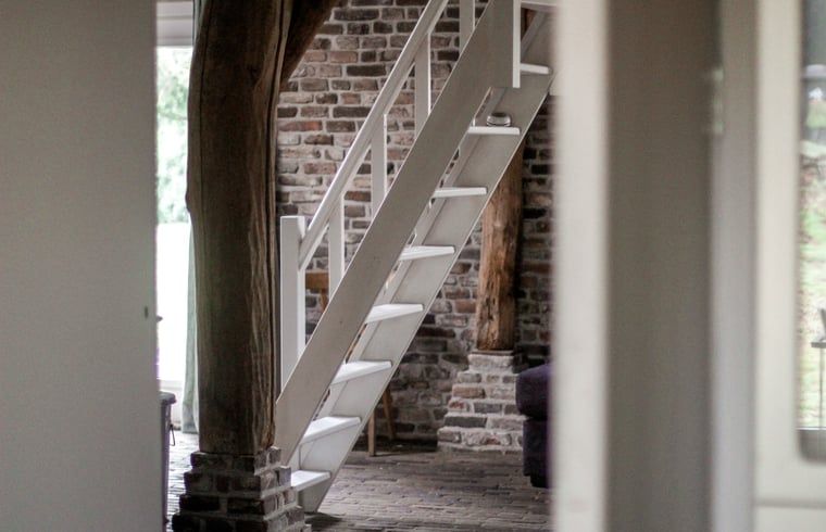 Relaxing bathroom experience at Holiday Home in Altforst, Gelderland with candles for a serene atmosphere.
