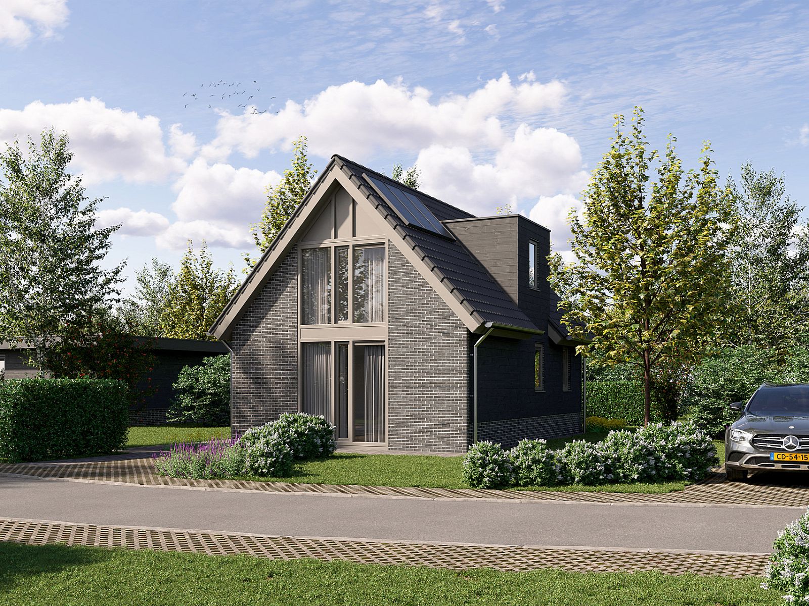 Voorzijde van de Vrijstaande woning in Eck en Wiel, Gelderland, met parkeerplaats en natuurlijke omgeving.