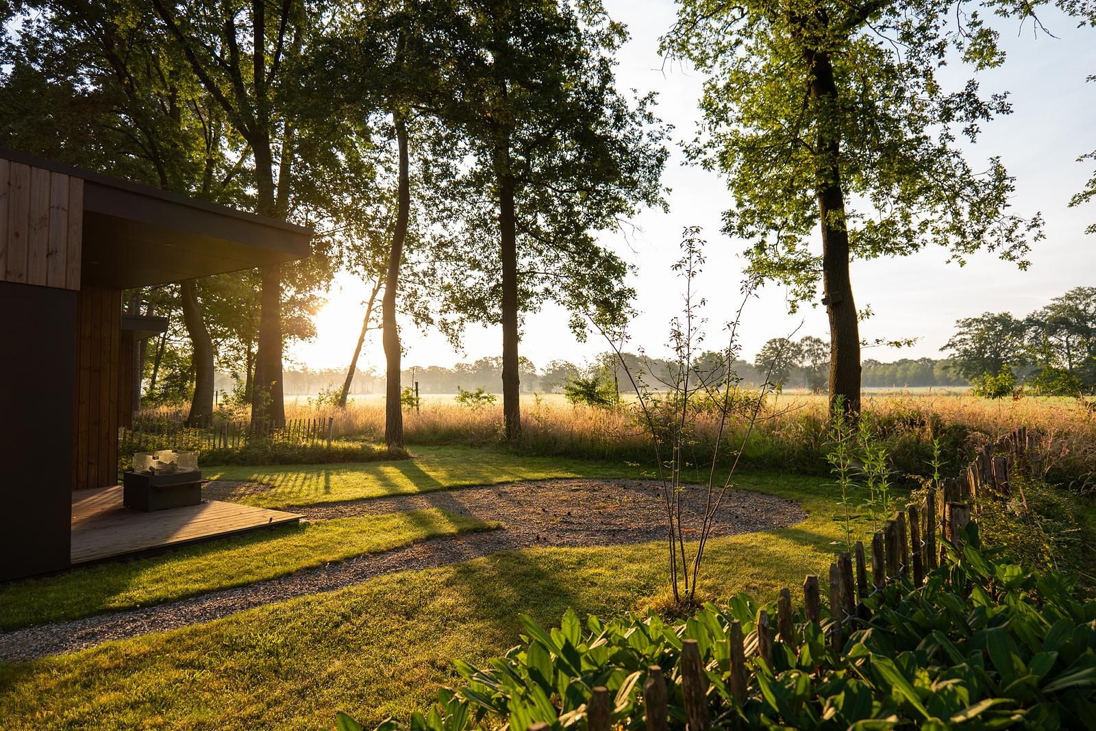 Enjoy the serene surroundings at Holiday Villa Boslodge 2 in Kotten, Achterhoek, with stunning views of the countryside of Gelderland.