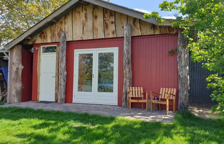 Rustic cottage in Westendorp with wooden details, in the middle of Achterhoek, Gelderland.