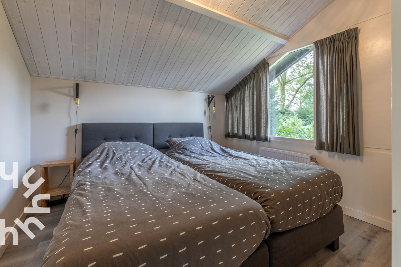 Buitenzijde van vakantiehuis DG994 in Aalten, Achterhoek, met bakstenen gevel.