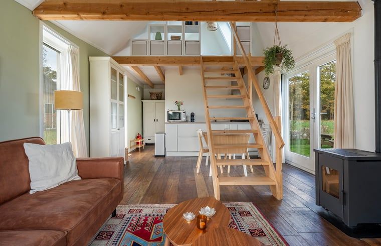 Cozy interior of Holiday cottage in Laren, Achterhoek, with wooden interior and spacious living room in Gelderland.