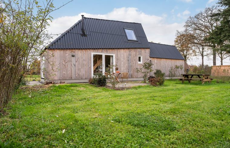 Aerial photo of Holiday cottage in Laren, located in the green fields of Achterhoek, Gelderland, surrounded by nature and tranquility.