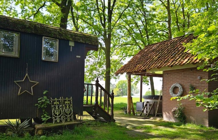Decorative wooden door in Holiday home in Vragender, Achterhoek, Gelderland. Atmospheric details in the interior.