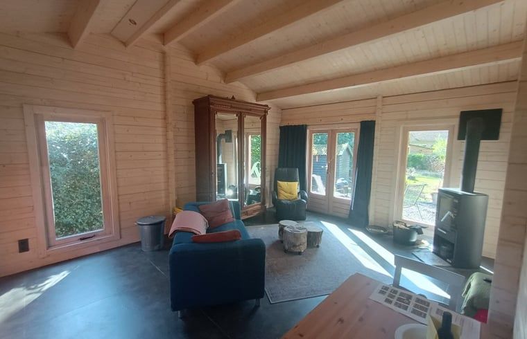 Spacious indoor space in Holiday Home in Lochem, ideal for family gatherings.