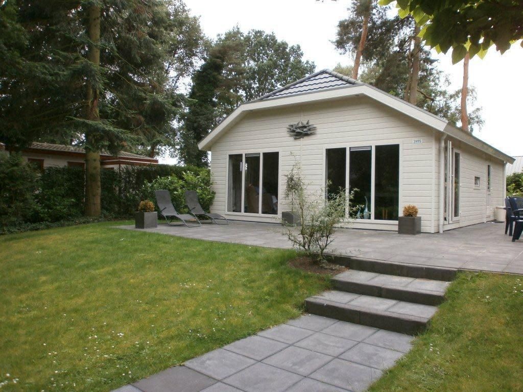 Hackfort 4 vakantiehuis in Lochem, Achterhoek met zonnig terras en groene tuin, ideaal voor ontspanning in de natuur van Gelderland.