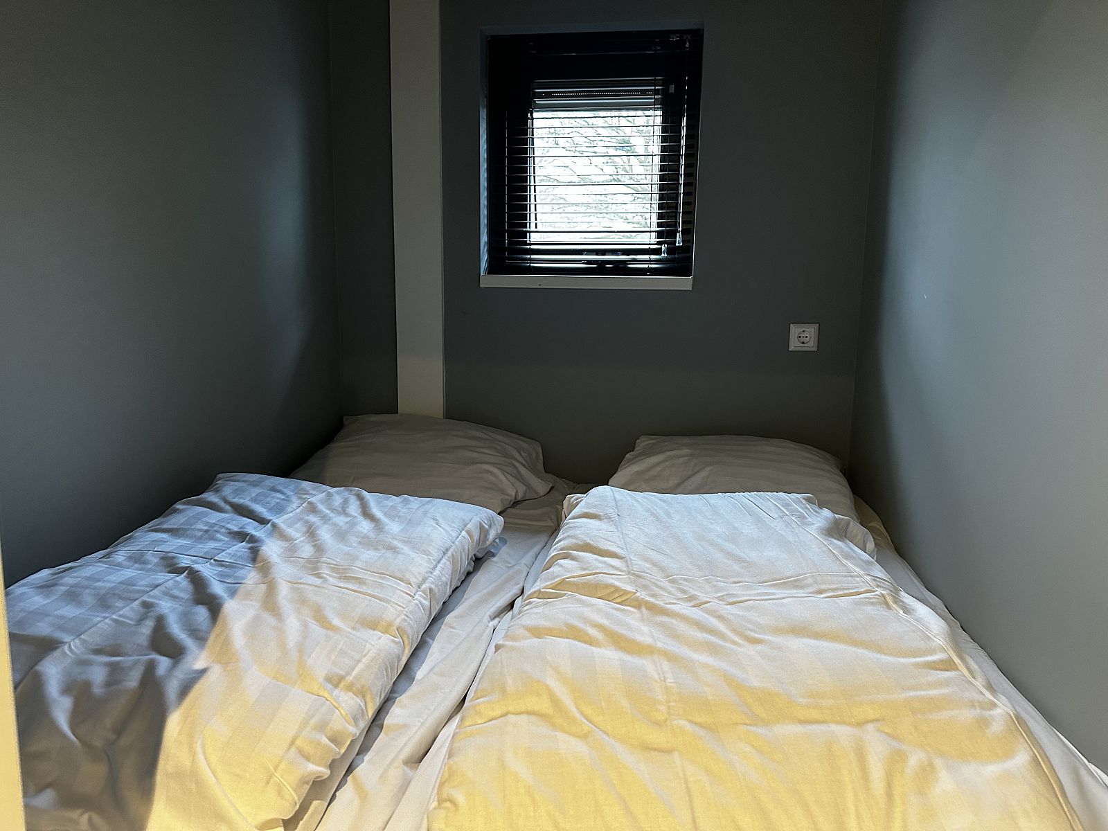 Cozy sleeping corner in Chalet in Lochem, perfect for relaxation in Achterhoek, Gelderland.