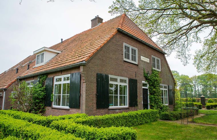 Charmant vakantiehuis in Lochem, Achterhoek, omgeven door groene natuur en rustieke architectuur in Gelderland.