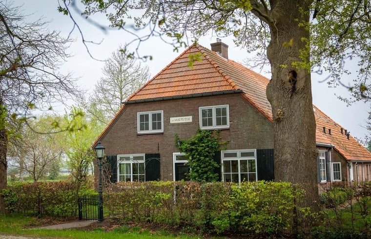 Vakantiehuis in Lochem, charmant verblijf in de Achterhoek, Gelderland omgeven door groene natuur en rustieke omgeving.