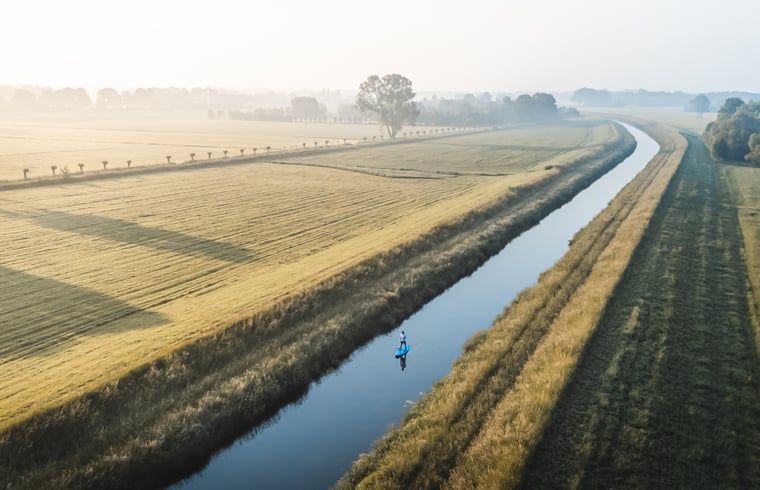 Luchtfoto van rivierlandschap bij Vakantiehuisje in Haarlo, Achterhoek, Gelderland voor een adembenemend uitzicht.