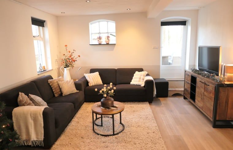 Holiday home in Geesteren, located in the picturesque Achterhoek region of Gelderland, with a charming exterior and inviting terrace.