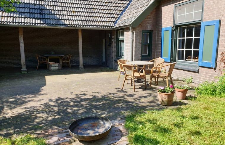 Enjoy the charming outdoor space at Holiday Home in Vorden, Achterhoek, Gelderland, perfect for relaxing in nature.