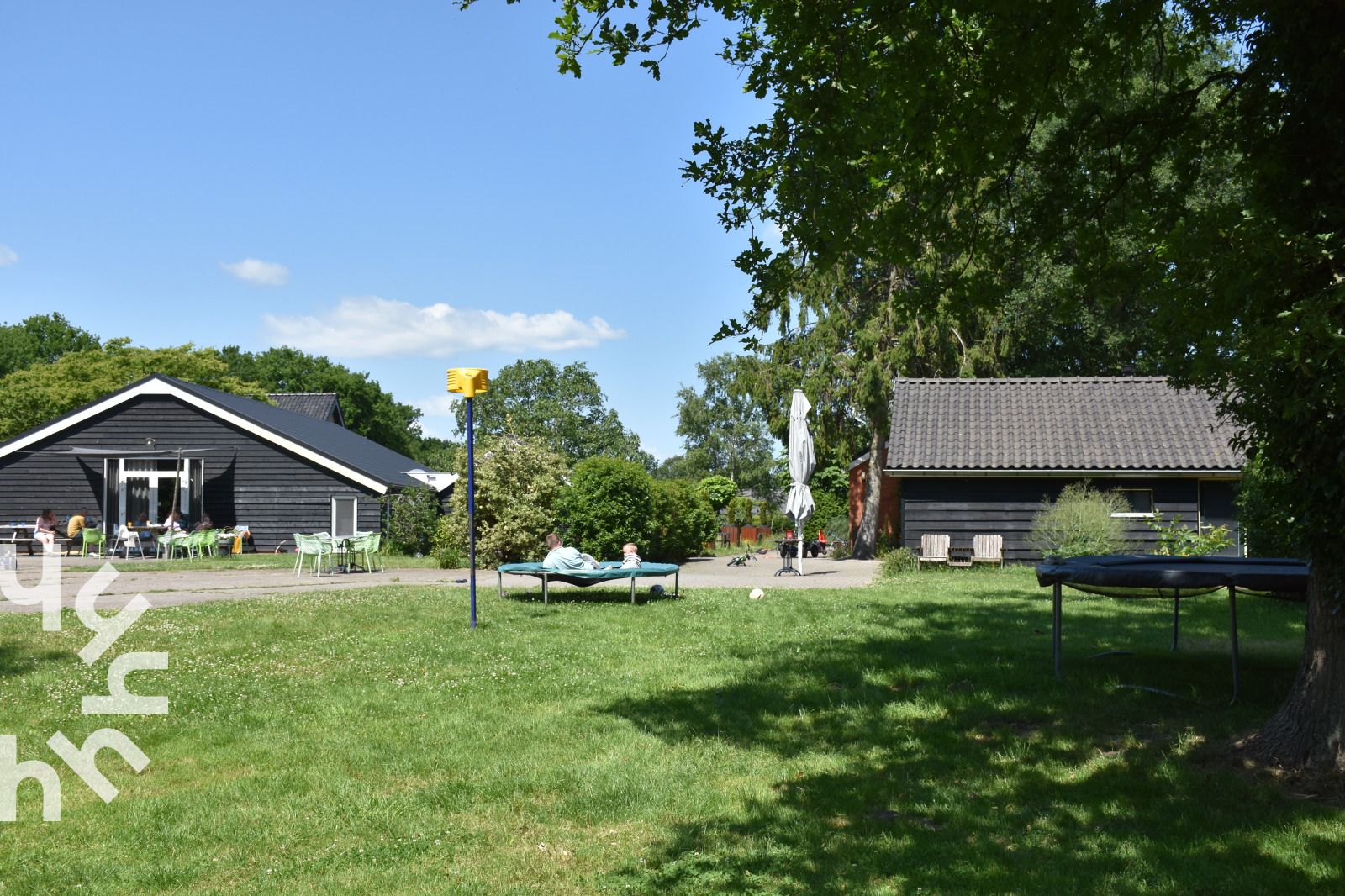 Vacation home DG127C in Vorden, Achterhoek with spacious garden and seating area.