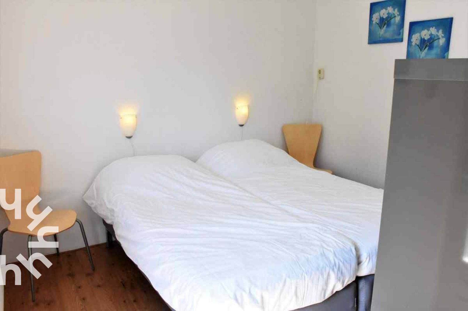 Sonnige Terrasse am Ferienhaus DG126 in Vorden, Achterhoek, Gelderland mit Trampolin.