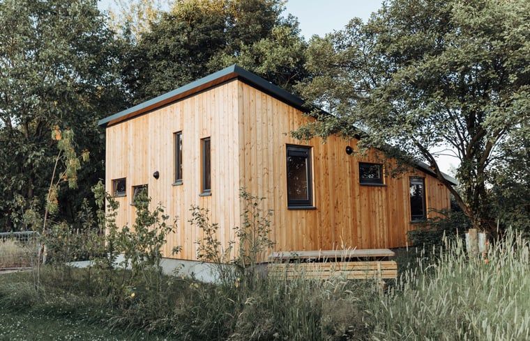 Huisje in Doetinchem, een vakantiehuis in de Achterhoek, Gelderland, omgeven door groene natuur en rustgevende omgeving.