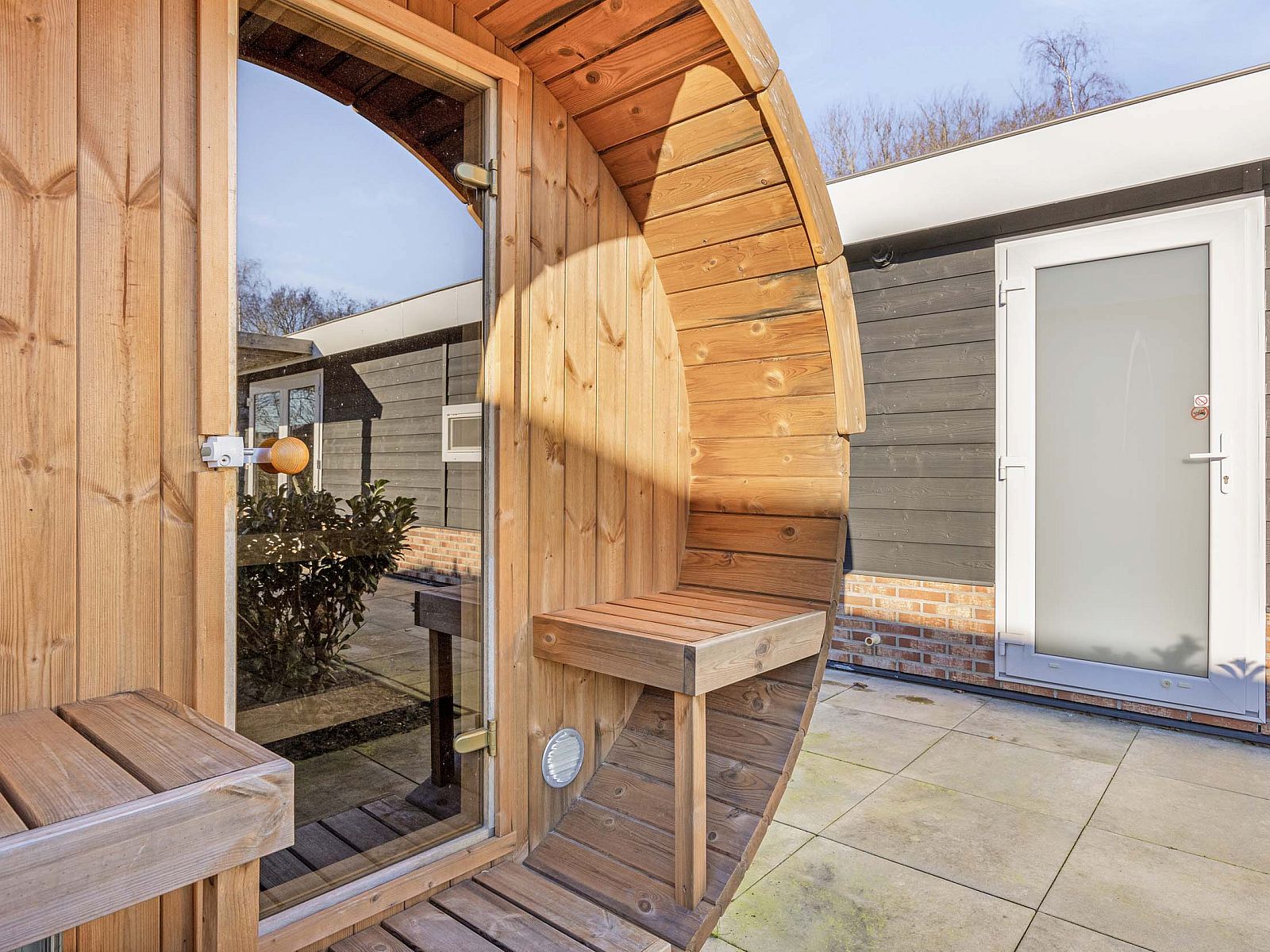 Wooden sauna at Lindenhoeve 2.0 vacation home in Lichtenvoorde, perfect for relaxation in Achterhoek, Gelderland.