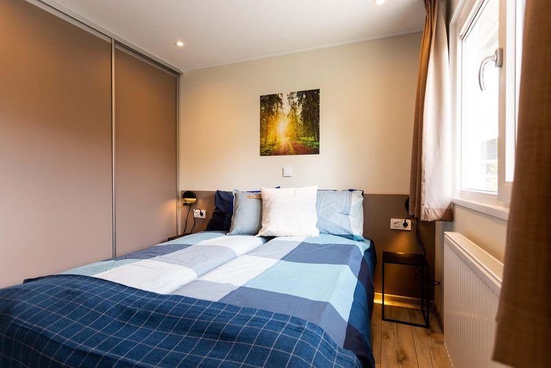 Gemuetliches Schlafzimmer in Wilgenhoeve 5 Personen, Lichtenvoorde, mit komfortablem Doppelbett in einer Ferienwohnung, Achterhoek, Gelderland.