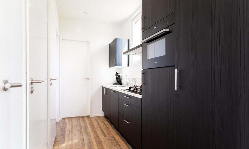 Stylish kitchen in Module Special 6 persons Wellness, vacation home in Lichtenvoorde, with modern appliances.