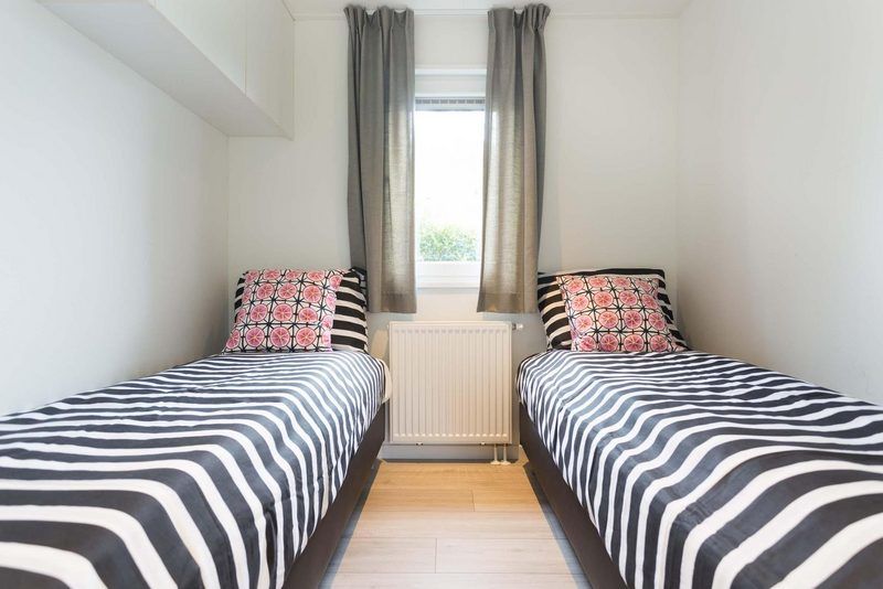 Zweites Schlafzimmer mit zwei Einzelbetten in Parel Ferienhaus fuer 4 Personen, Lichtenvoorde, Achterhoek, Gelderland.
