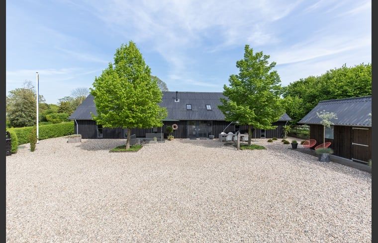 Ferienhaus in Zeddam, ein charmantes Ferienhaus in Achterhoek, Gelderland, umgeben von gruener Natur und rustikaler Architektur.