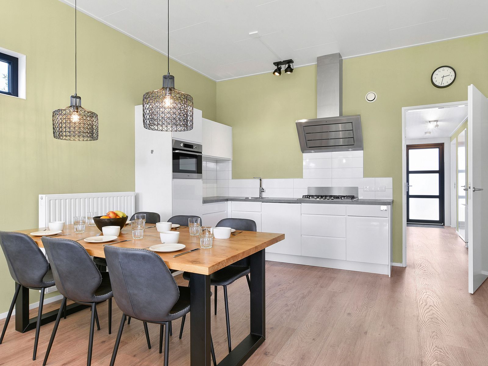 Outdoor area with parasol at The Butterfly Farm bungalow, Kring van Dorth.